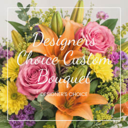 Mixed bouquet with pink roses, orange lilies, and yellow daisies