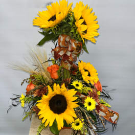 Sunflower and orange rose arrangement with autumn ribbon