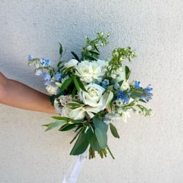 White and blue bouquet with roses and mixed blooms