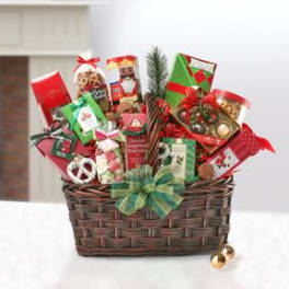 Holiday gift basket with assorted chocolates and treats in a wicker basket