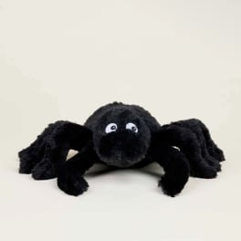 Black plush spider toy with large eyes on a plain background