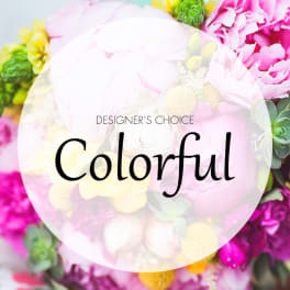 Colorful mixed flower arrangement with pink and yellow blooms