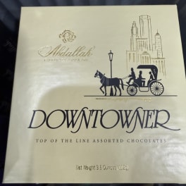 Box of assorted chocolates with a city-themed design