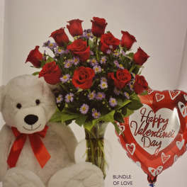 Red rose bouquet with a teddy bear and Valentine balloon