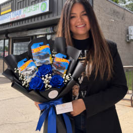 Woman holding a bouquet of blue roses and Hot Wheels packages