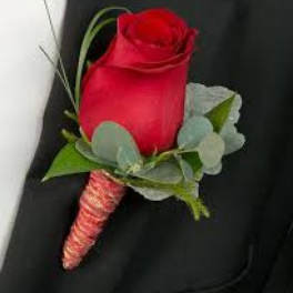 Single red rose boutonniere with greenery and a wrapped stem