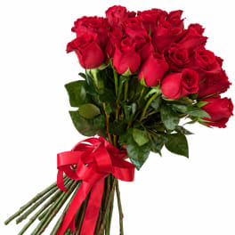 Bouquet of red roses tied with a red ribbon