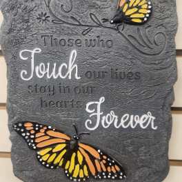 Decorative wall plaque with butterflies and a quote