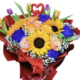 Bouquet of sunflowers, roses, and tulips wrapped in red paper