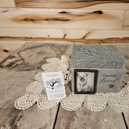 Gray memorial keepsake box with a small photo frame and "Forever Loved" text