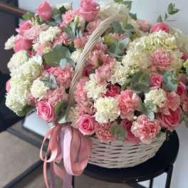 beautiful basket with dianthus, hydrangea and spray roses