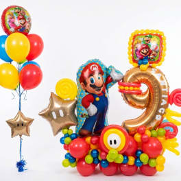 Mario-themed balloon display with colorful balloons and foil character balloons