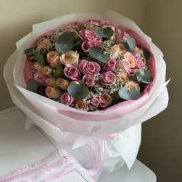 Bouquet of pink and cream roses