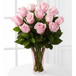 Bouquet of pink roses with green foliage