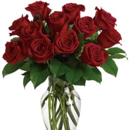 Bouquet of red roses in a clear glass vase