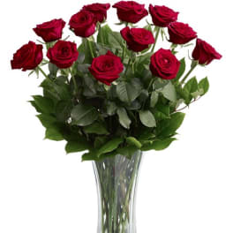 Bouquet of red roses in a clear glass vase