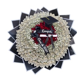 Graduation money bouquet with red roses and a cap topper