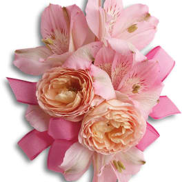 Pink and peach floral corsage with ribbon