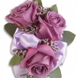 Lavender rose bouquet with satin ribbon and greenery