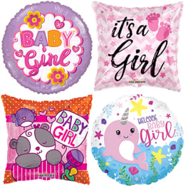 Four baby-themed foil balloons with girl and boy designs