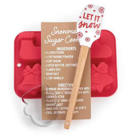 Red cookie mold with a recipe card and a spatula reading "Let it snow"