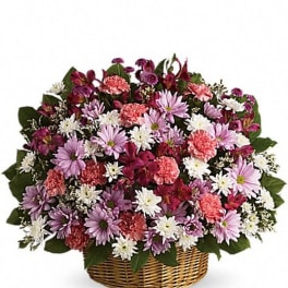 Basket of pink, purple, and white mixed flowers