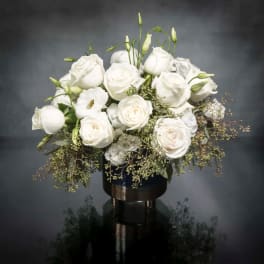 White rose bouquet in a dark vase