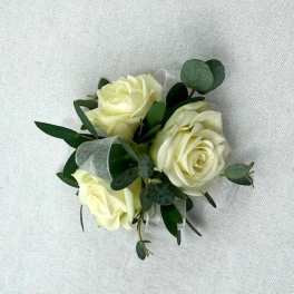Small bouquet of cream roses with greenery and ribbon