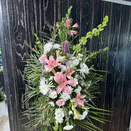 Tall standing floral spray with pink lilies and white blooms