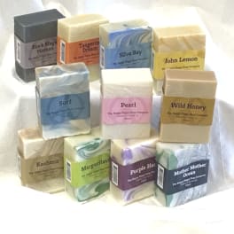 Assorted boxed soap bars arranged in a display