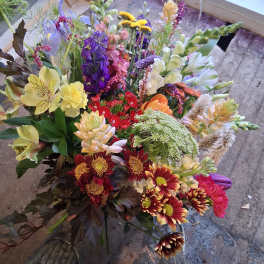 Mixed bouquet with colorful flowers in a loose hand-tied arrangement