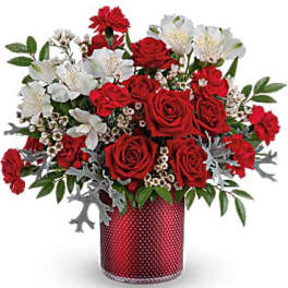 Red roses and white alstroemeria in a red textured vase