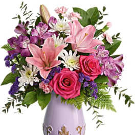 Pink and purple mixed bouquet in a lavender vase