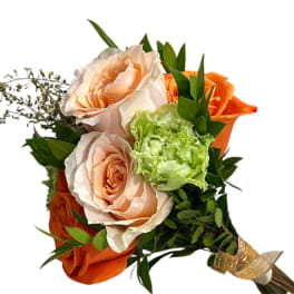Peach and orange rose bouquet with green carnation and ribbon wrap