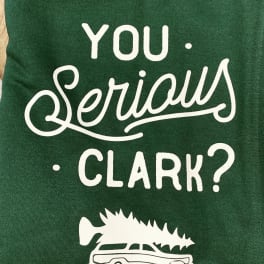 Green shirt with white text reading "You Serious Clark?"