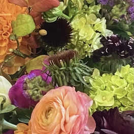 Colorful bouquet of mixed flowers including pink and orange blooms