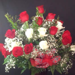 Bouquet of red and white roses in a vase
