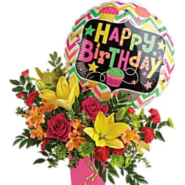 Birthday bouquet with a colorful balloon and pink vase