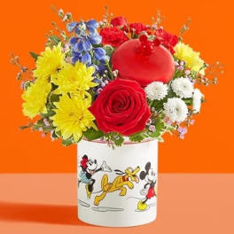 Colorful bouquet in a Mickey Mouse mug with a red balloon topper