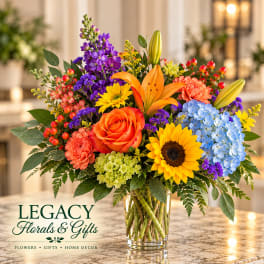 Colorful mixed bouquet in a clear glass vase