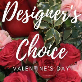 Red and pink roses with variegated greenery and Valentine's Day text