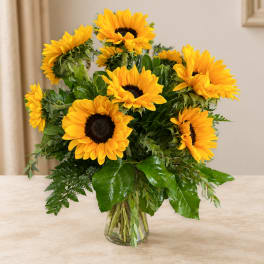 Sunflower bouquet in a clear glass vase