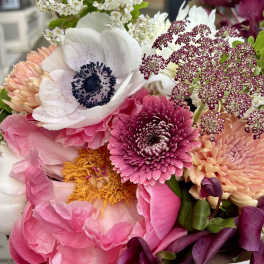 Mixed bouquet with pink, white, and purple flowers