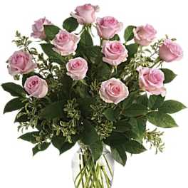 12 Pink Roses arranged in a vase.