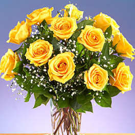 12 Yellow Roses arranged in a glass vase