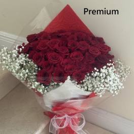 24 Red Roses Long Stems wrap arranged.