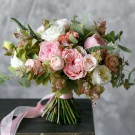 Pink and white rose bouquet with greenery and ribbon