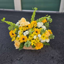 Yellow and cream flower basket with roses and daisies