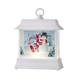 White holiday lantern with a snowman scene inside