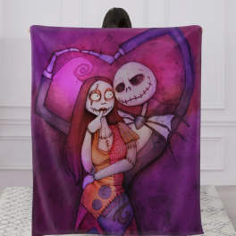 Purple blanket with a cartoon skeleton couple in a heart pose